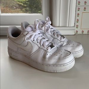 White low top Air Force 1s in a size women’s 8
